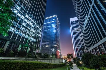 City square and modern high-rise buildings, night view of Jinan, China.