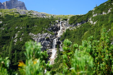 Fototapeta premium Secret waterfall on Val Fiscalina on a trekking day for Tre Cime di Lavaredo, Dolomites, Unesco, Italy, Sudtirol, Trentino Alto Adige