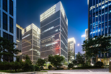 City square and modern high-rise buildings, night view of Jinan, China.