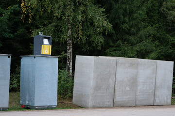 New underground garbage recycling containers waiting to be installed.