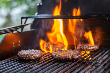 Hamburger on Grill with flames