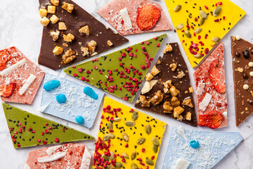 Hand-made bars of colorful chocolate  - 375644238