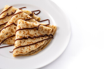 Sweet crepes with chocolate isolated on white background. 	