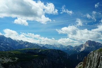 Obraz premium Mountain range of Belluno Alps from Three Peaks of Lavaredo hike on a summer day, Sudtirol, Trentino Alto Adige, Italy, Dolomites, Unesco