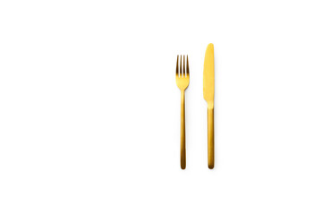 Top view with golden cutlery isolated on white background