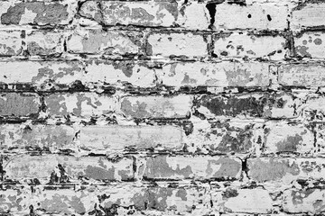 Texture of a concrete wall with cracks and scratches which can be used as a background