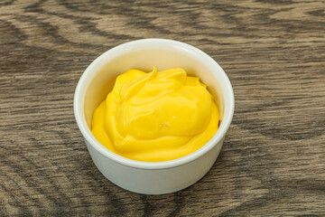 Natural cheese sauce in the bowl