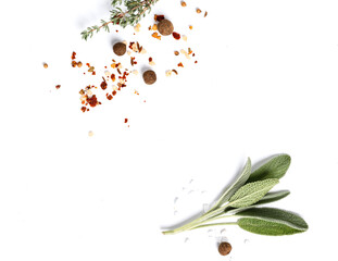 Various spices and herbs on a white background top view. Free space for text. Food background, ingredients for cooking.