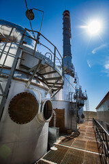 Sulfuric acid plant. Furnace for sulfur burning to sulphur dioxide and smoking stack (factory...