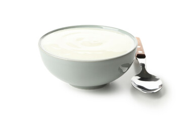 Bowl of sour cream yogurt and spoon isolated on white background