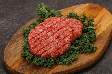 Raw beef burger cutlet for cooking