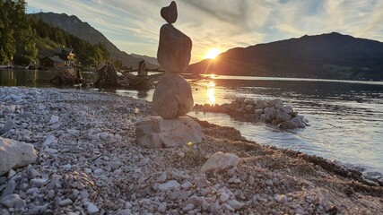Steine See Landschaft Berge Sonneuntergang steinturm
