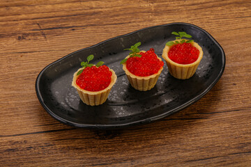 Apetizer - tartlet with red caviar