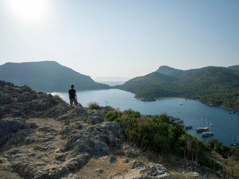 Man standing overlooking a bay in Turkey