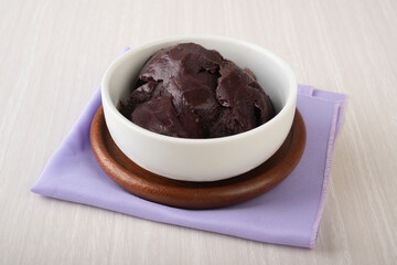 Brazilian typical acai bowl over wooden background