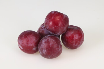 Sweet ripe plum isolated on white