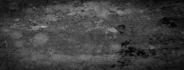 Fototapeta premium Old wooden board background The old plank has a black-gray wood pattern that has been exposed to the sun for many years and is suitable for design.