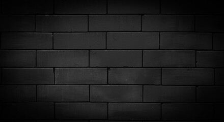 Unplastered black brick wall and texture The texture of the brick is black.
