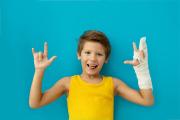 A child with a plaster on his hand. Copy space