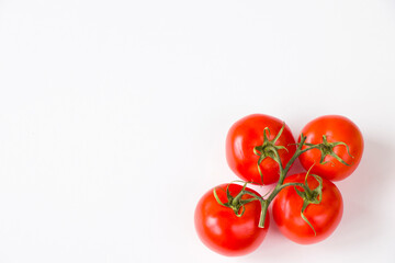 Red four tomatoes on the white background