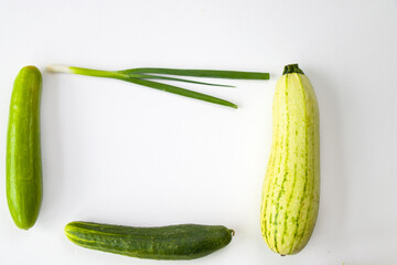 Green vegetables on the white background