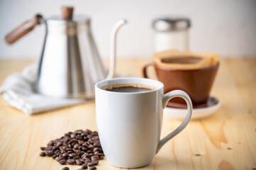 dripping coffee on wooden kitchen table
