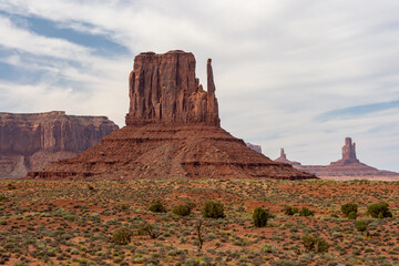 Picture of iconic West Butte rock formation in Oljato-Monument Valley taken on a summer cloudy day...