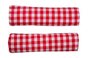 Rolled towels isolated. Close-up of red and white checkered napkin or picnic tablecloth texture isolated on a white background. Kitchen towel.