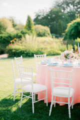 wedding table and chairs in a garden