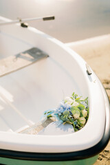 fine art wedding bouquet in the boat