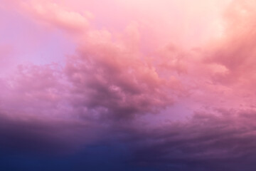 Obraz premium Cloudy sky in orange light.