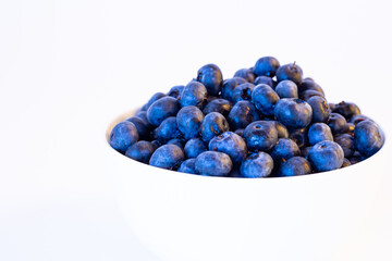 Blueberries isolated on a white background. Healthy lifestyle of vitamin fruits.