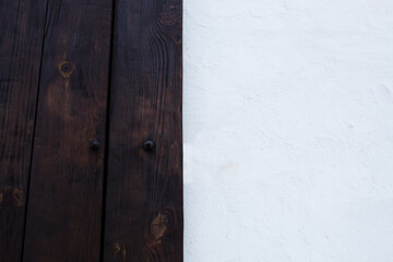 old wooden door and white wall