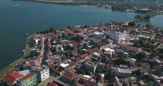 Aerial drone view of the lake and town of Flores Island in Peten, Guatemala
