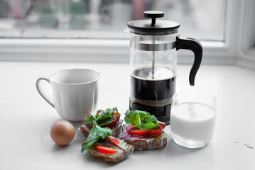 coffee with sandwiches and egg