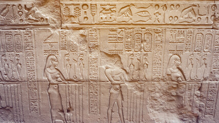 Egypt Hieroglyphic god face got destroyed at Edfu Horus temple feature wall