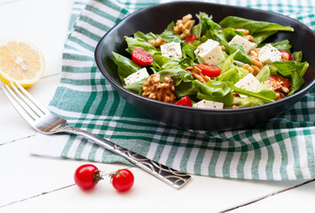 Arugula, feta cheese and walnut salad. healthy eating
