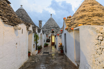 The Trullo. A trullo is a dry stone hut with a conical roof. Each trullo is decorated with pinnacle and symbol. Symbols are divided into 3 categories primitive, christian and magical.