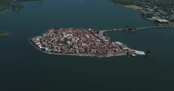 Aerial drone view over the Flores Island in Peten, Guatemala