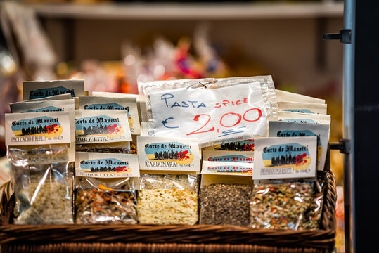 Florence, Italy - August 30, 2018: Firenze Mercato Central Market Closeup Of Dried Herbs Spices Mix For Pasta Colorful And Sign Price In Retail Display In Stall