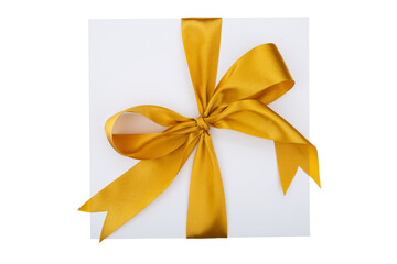 White gift box with yellow ribbon on white background. Top view.