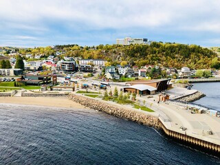 Cityscape and Port of Saguenay, located in the heart of Saguenay-Lac-St-Jean industrial region, is a natural gateway to Northern  Quebec.  Aerial view.
