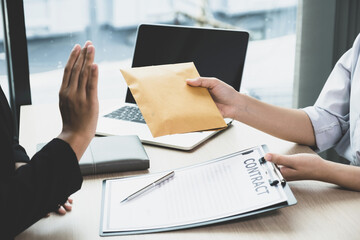 Government officials refusing money to take the bribe money from business man the concept of corruption and anti bribery