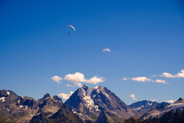 Paraglider over the mountains of French Alps