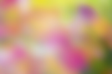 Abstract background of bright yellow, orange, pink, green, purple, colorful spots