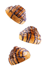 Roll bun with chocolate glaze on a white isolated background