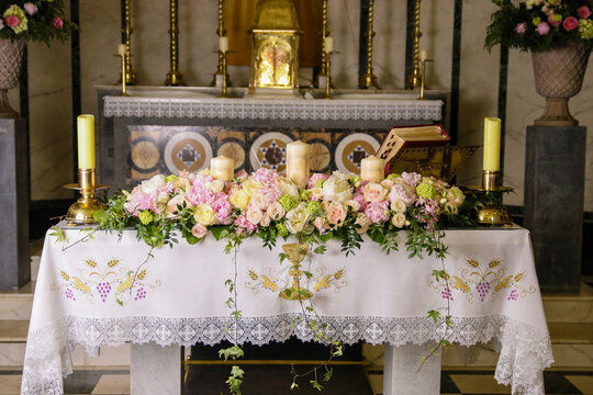 Altar decorated for the wedding ceremony. Flowers in church.