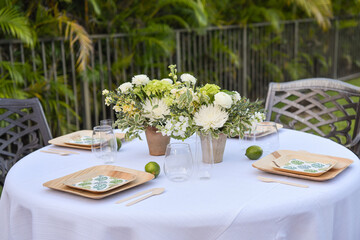 Casul table setting in a backyard for a family gathering
