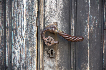 Old Wooden Entrance Door With Antique Door Handle Knob Made From Metal