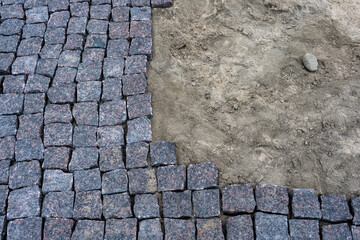 stones and stone laying of the embankment